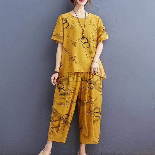 YELLOW CAPRI SETS , HALF SLEEVES PRINTED CAPRI SETS CH 1002